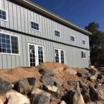 Galvanized steel barndominiums in Avra Valley, Arizona, showcasing modern design and durable construction for rural living