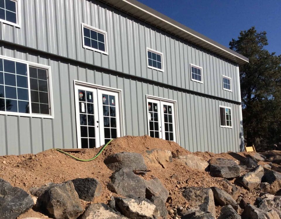 Galvanized steel barndominiums in Avra Valley, Arizona, showcasing modern design and durable construction for rural living