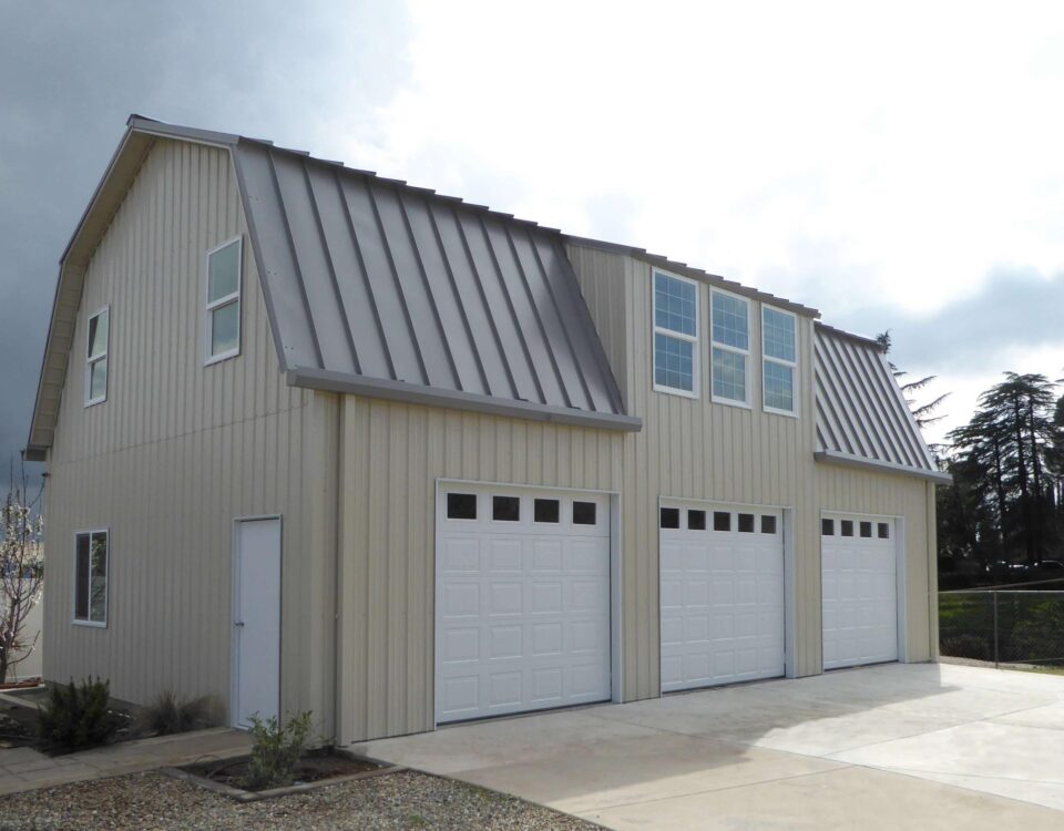 Beautiful galvanized steel barndominiums in Prescott Valley, Arizona, showcasing modern design against a stunning desert backdrop