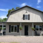 Stylish galvanized steel barndominiums in Somerton, Arizona, showcasing modern design and durability in rural living