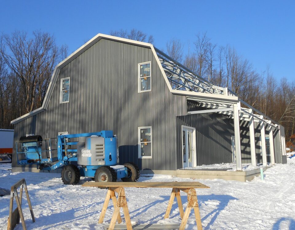 Image of galvanized steel barndominiums in Tucson Estates, Arizona, showcasing modern durability and rural charm