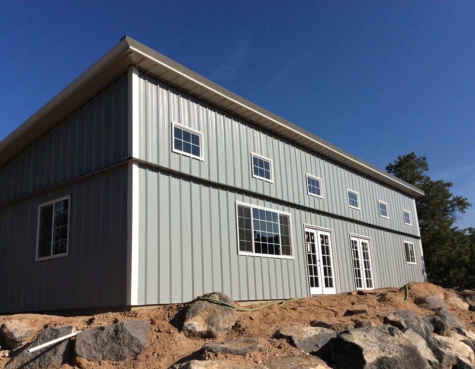 Charming galvanized steel barndominiums in Williamson, Arizona, showcasing modern design and rustic appeal