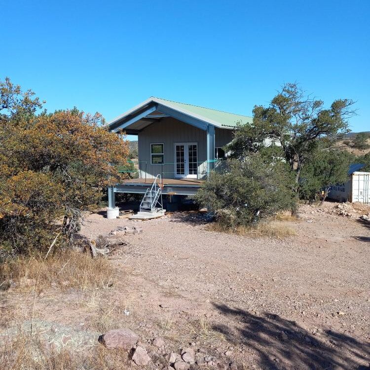 Modern galvanized steel cabins in Eloy, Arizona, showcasing durable construction and innovative design for comfortable living