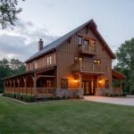 Exterior view of a beautiful 2 story barndominium with modern design and rustic charm.